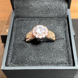 Beautiful ring with white stones on rose gold plated band